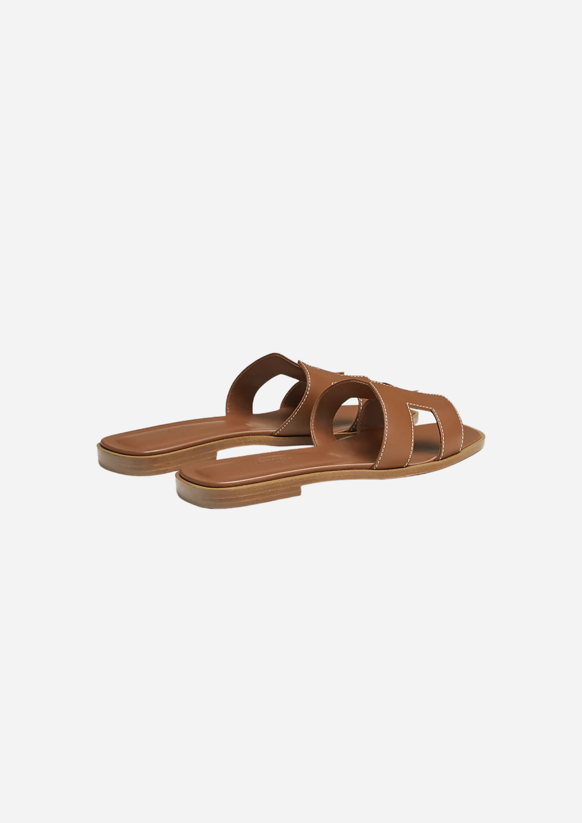 Sandali Hermès Oran Gold vista posteriore con suola in cuoio naturale