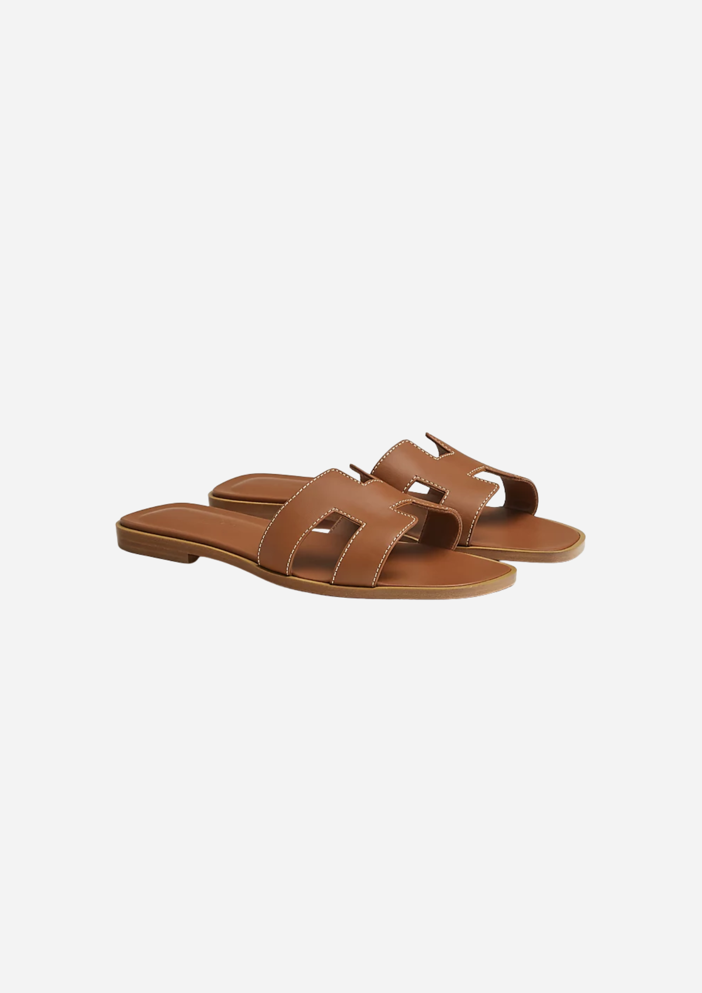 Sandali Hermès Oran Gold in vitello Box visti a tre quarti