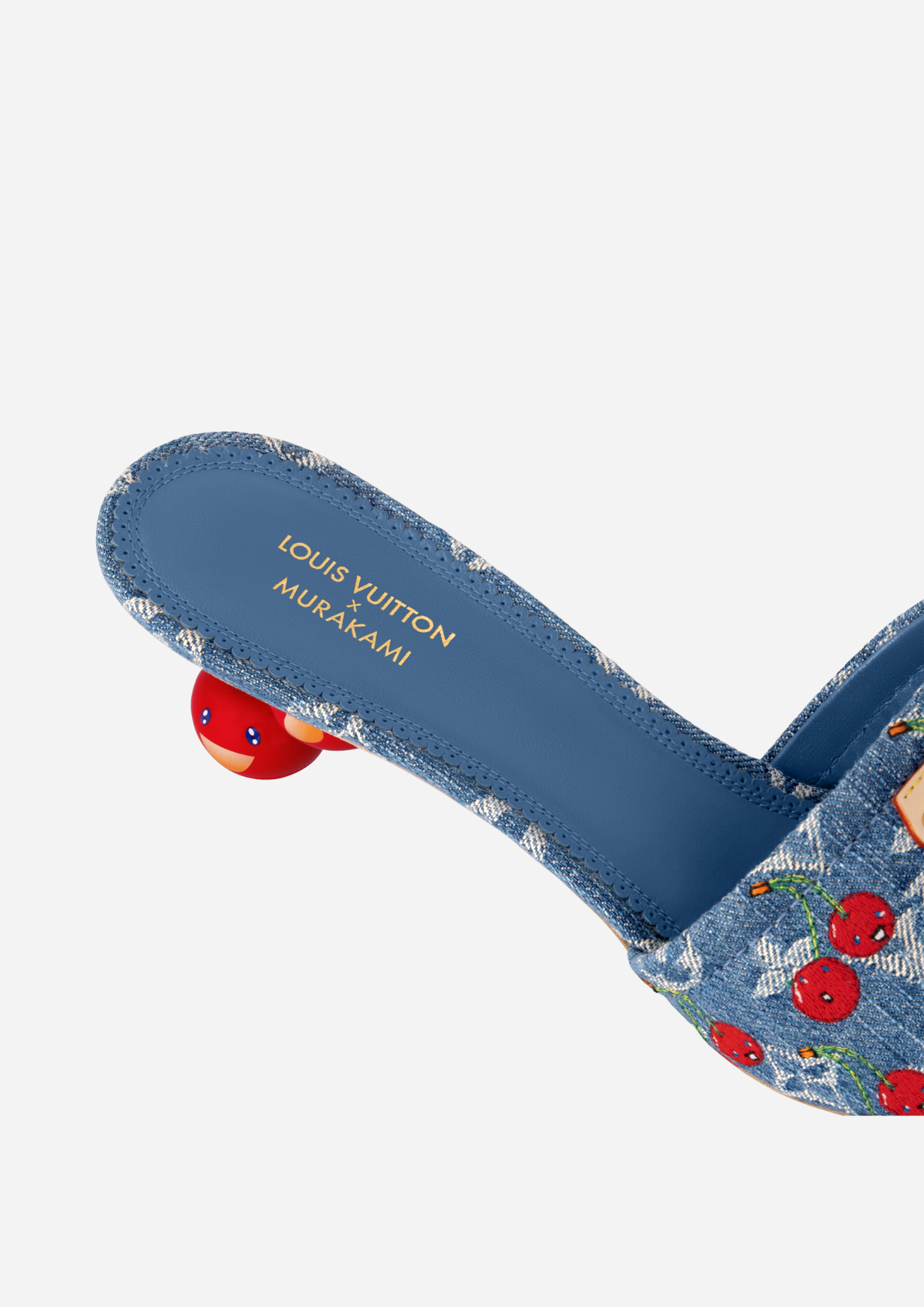 Dettaglio del tacco a forma di ciliegia della Louis Vuitton Lily Mule