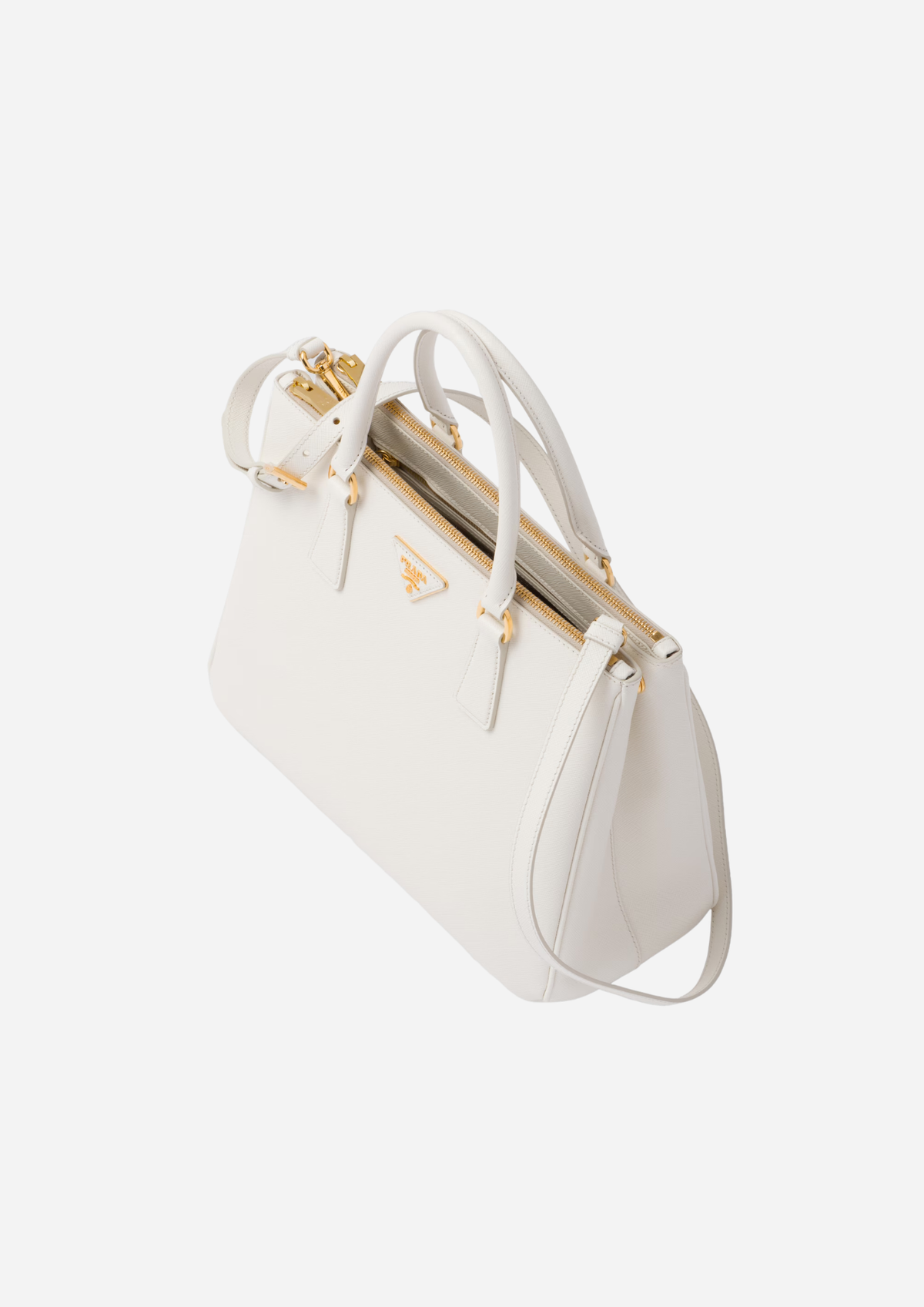 Prada Galleria Large bianca in Saffiano vista a tre quarti con tracolla rimovibile