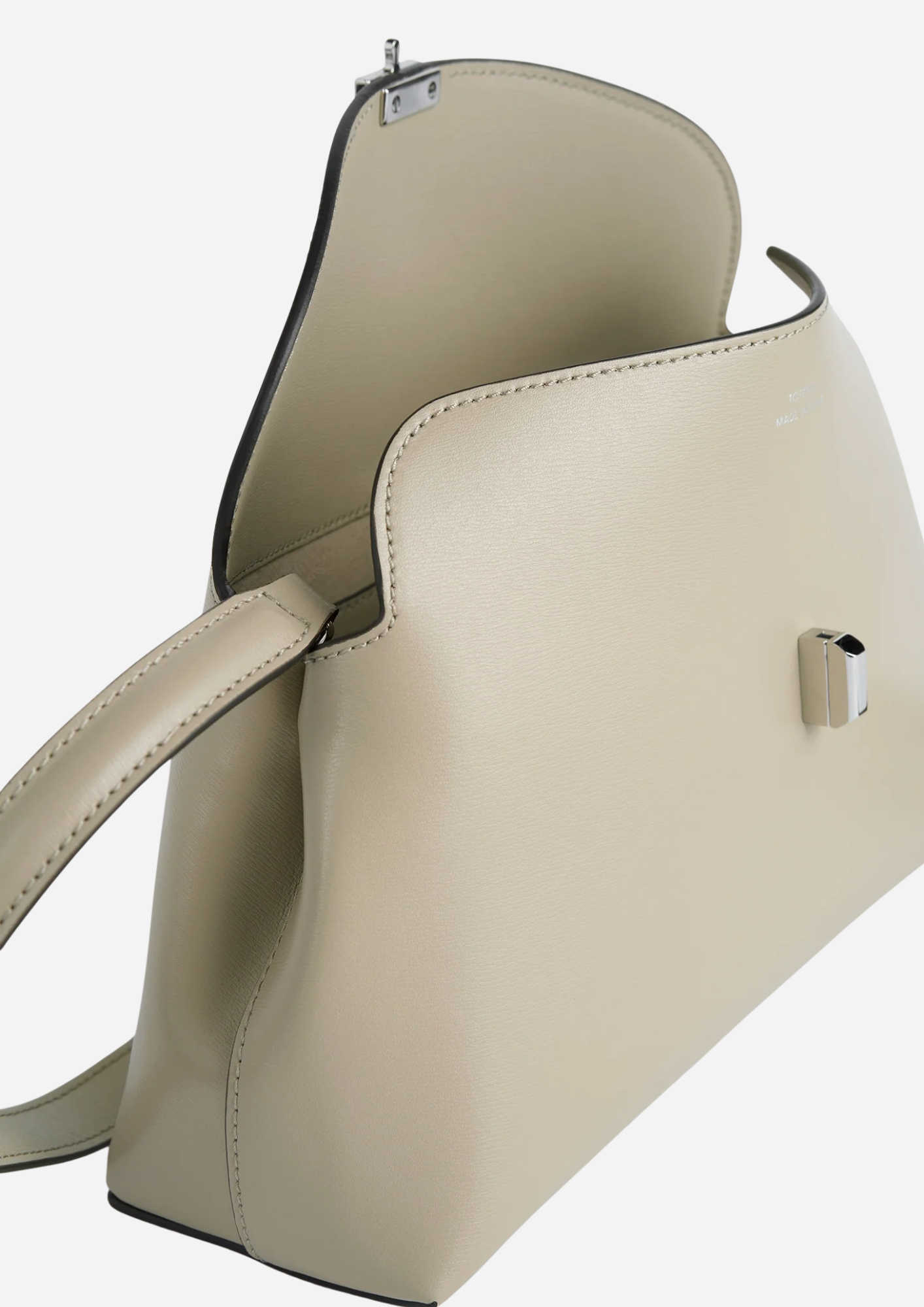 Toteme T-Lock Clutch Fawn con pattina aperta e interno beige
