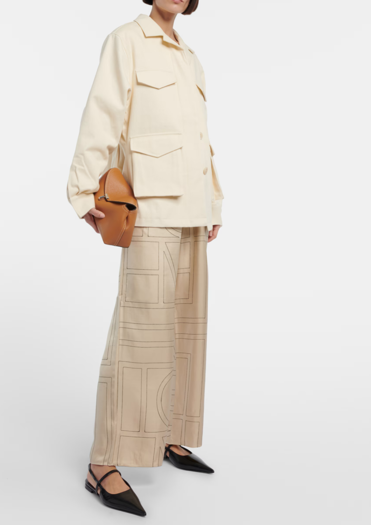 Toteme T-Lock Clutch Tan portata a mano come clutch
